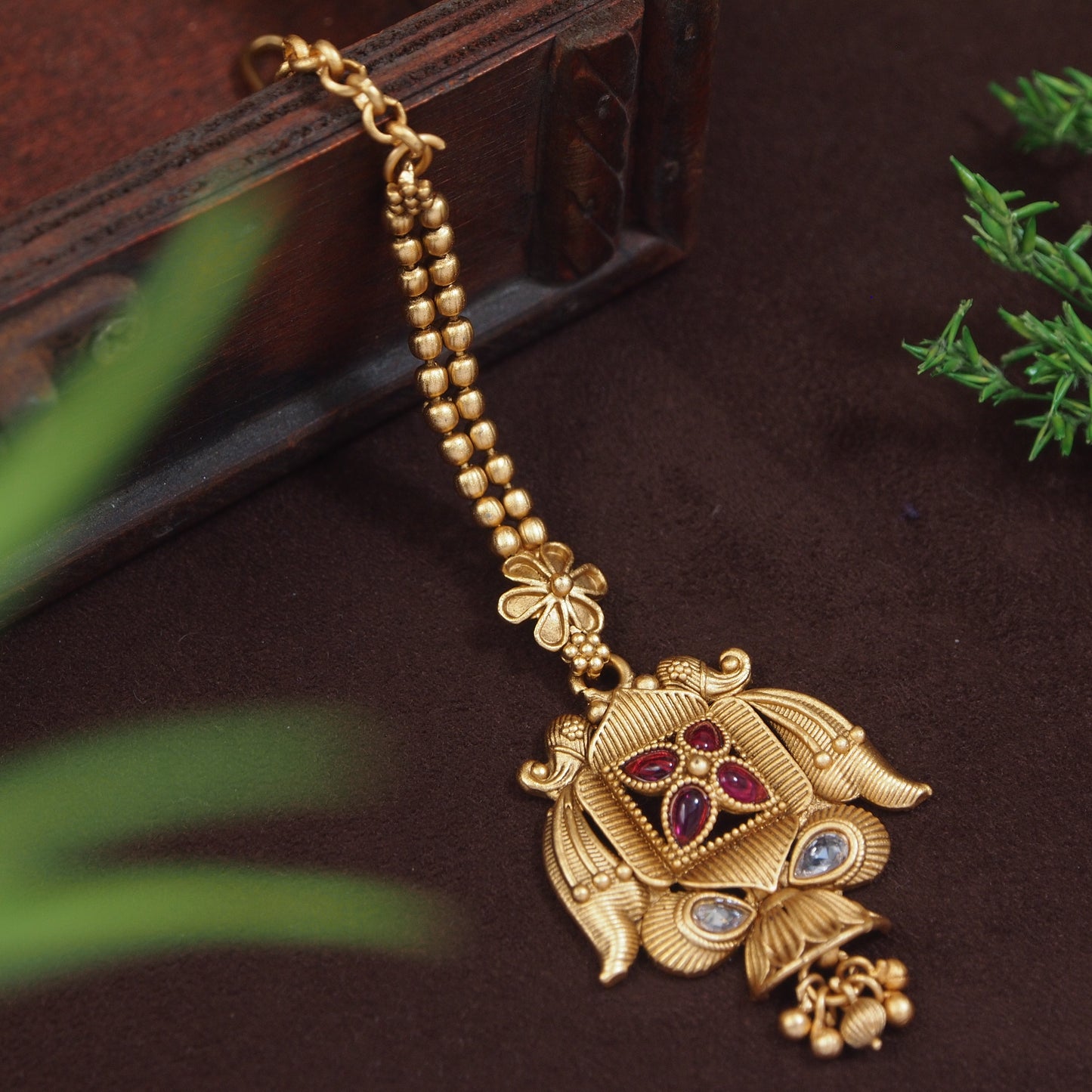 Traditional Matte Gold-Plated Maang Tikka with Intricate Temple Design