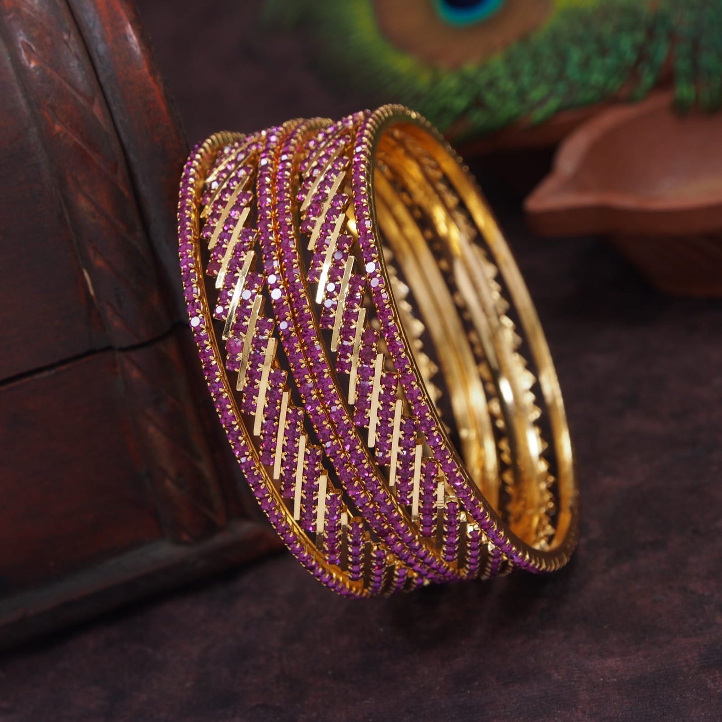 Elegant Stone Studded Gold-Toned Bangles