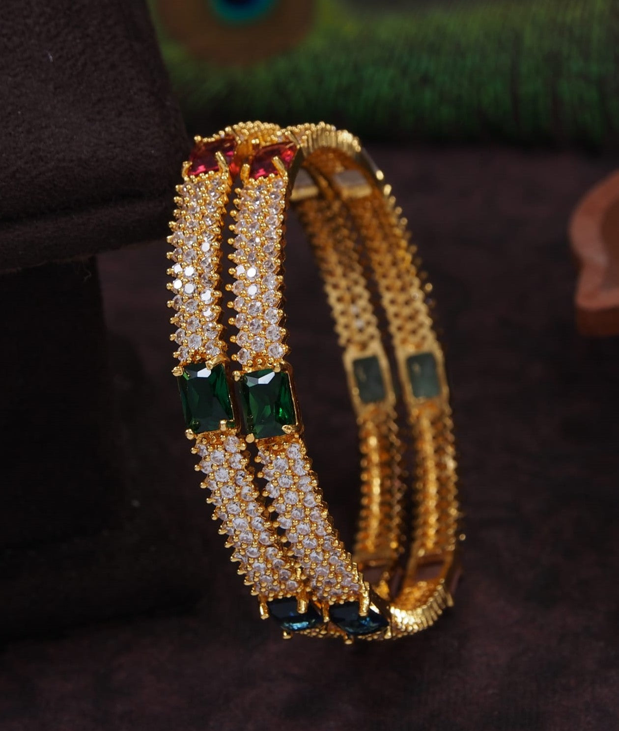 American Diamond Gold Brass Bangle Studded with Green and Ruby Stones