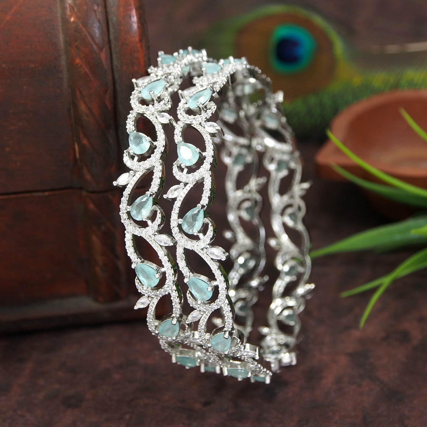 Exquisite Silver-Toned Designer Bangles with Mint Green Teardrop Stones
