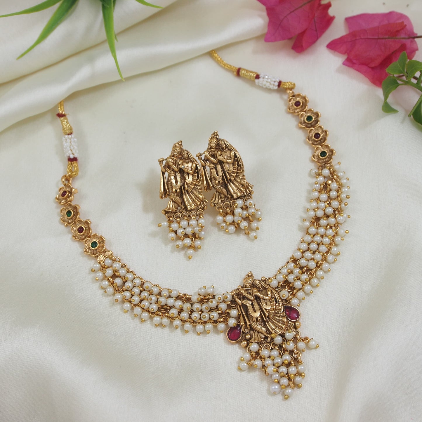 Traditional Gold-Plated Radha Krishna Necklace Set with Pearl Accents and Matching Earrings