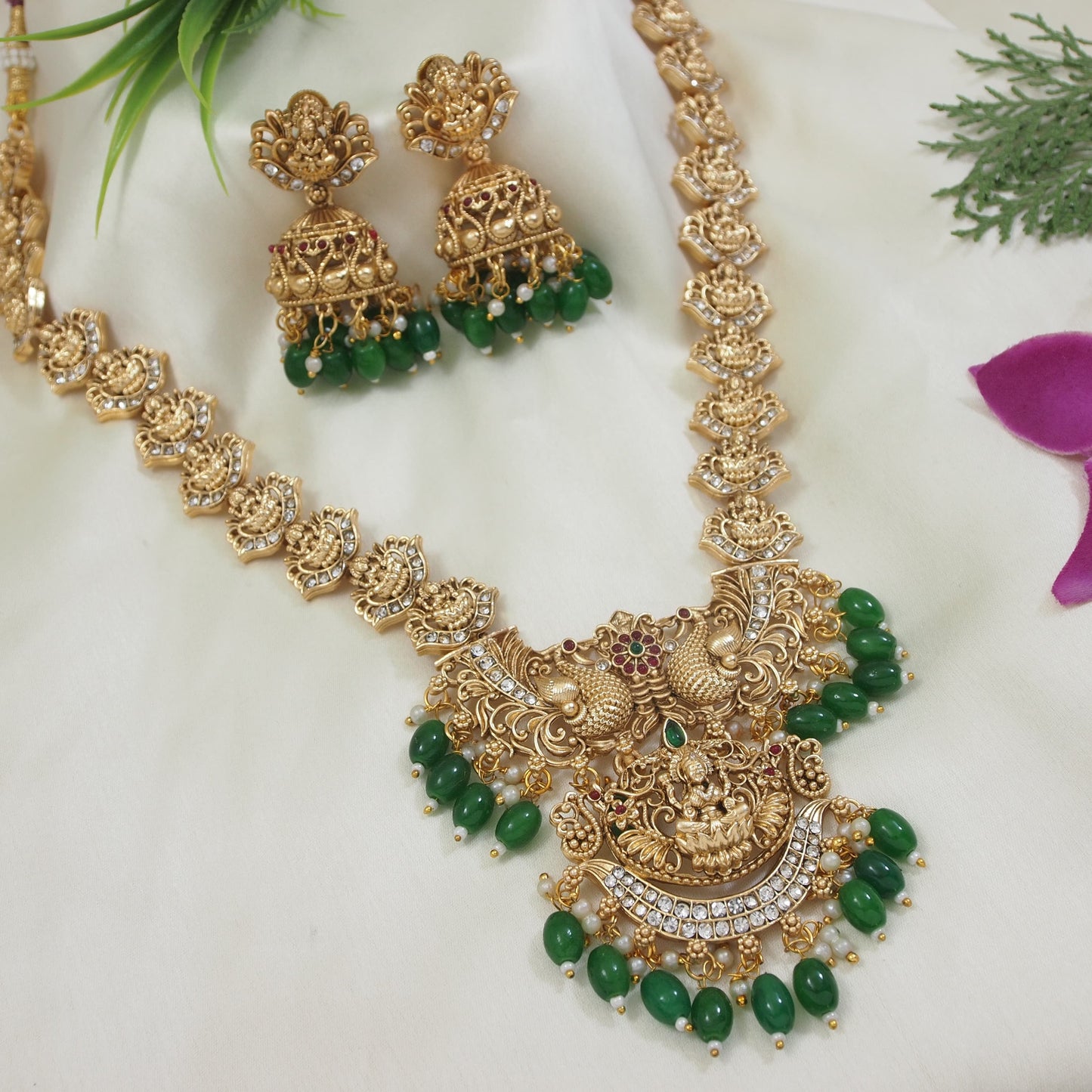 Traditional Peacock Motif Necklace with Green Bead Drops and Jhumkas