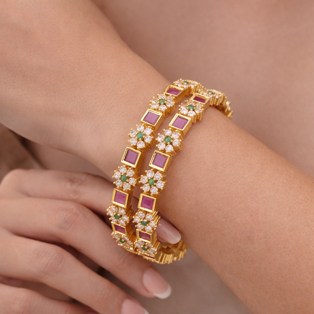 Orna Gold-Plated Floral Design Bangles with Ruby and Green Stone Embellishments - Set of 2