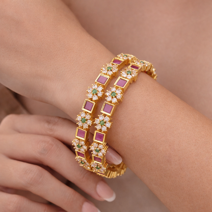 Orna Gold-Plated Floral Design Bangles with Ruby and Green Stone Embellishments - Set of 2