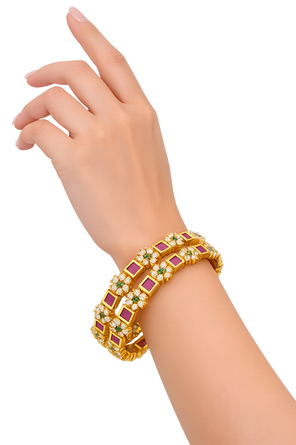 Orna Gold-Plated Floral Design Bangles with Ruby and Green Stone Embellishments - Set of 2