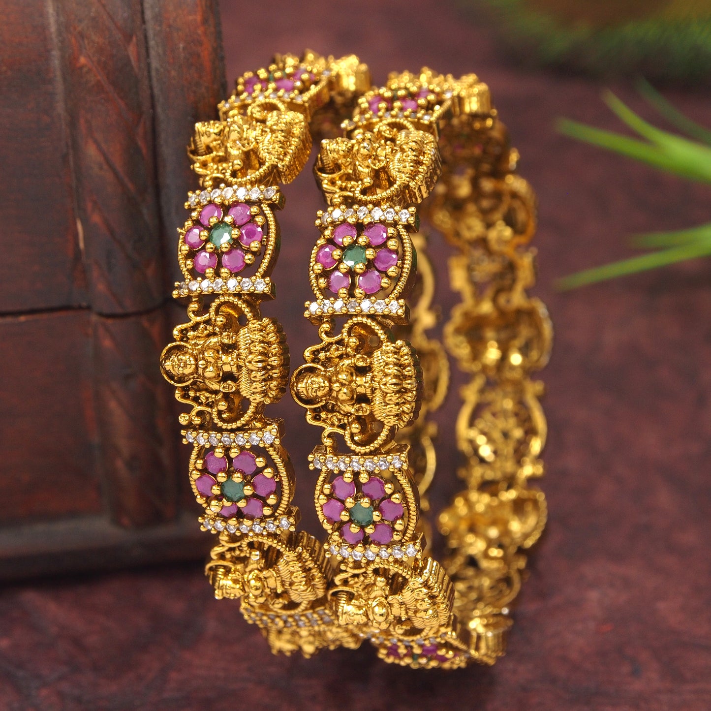 Matte Gold-Plated Brass Bangles with Ruby-Green AD Stones & Lakshmi Design
