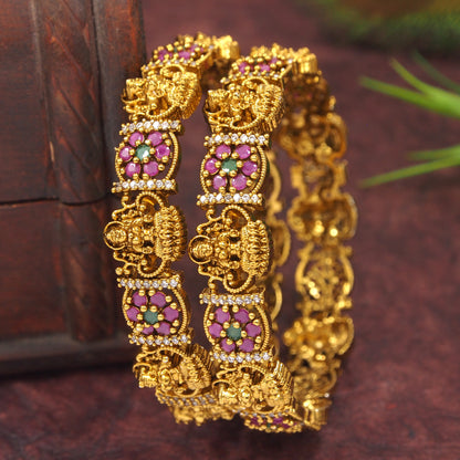 Matte Gold-Plated Brass Bangles with Ruby-Green AD Stones & Lakshmi Design