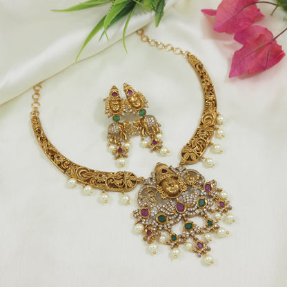 Matte Finish Brass Necklace Set with Lakshmi Pendant, American Diamonds & Pearls
