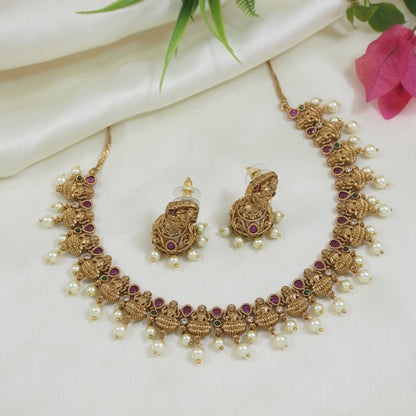 Traditional Brass Temple Necklace Set with American Diamonds and Pearl Accents