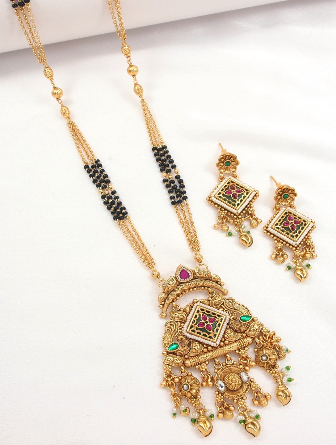 Ethnic Designer Gold Plated Black Bead Mangalsutra Set with Ruby & Emerald Coloured Stones