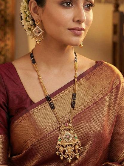 Ethnic Designer Gold Plated Black Bead Mangalsutra Set with Ruby & Emerald Coloured Stones