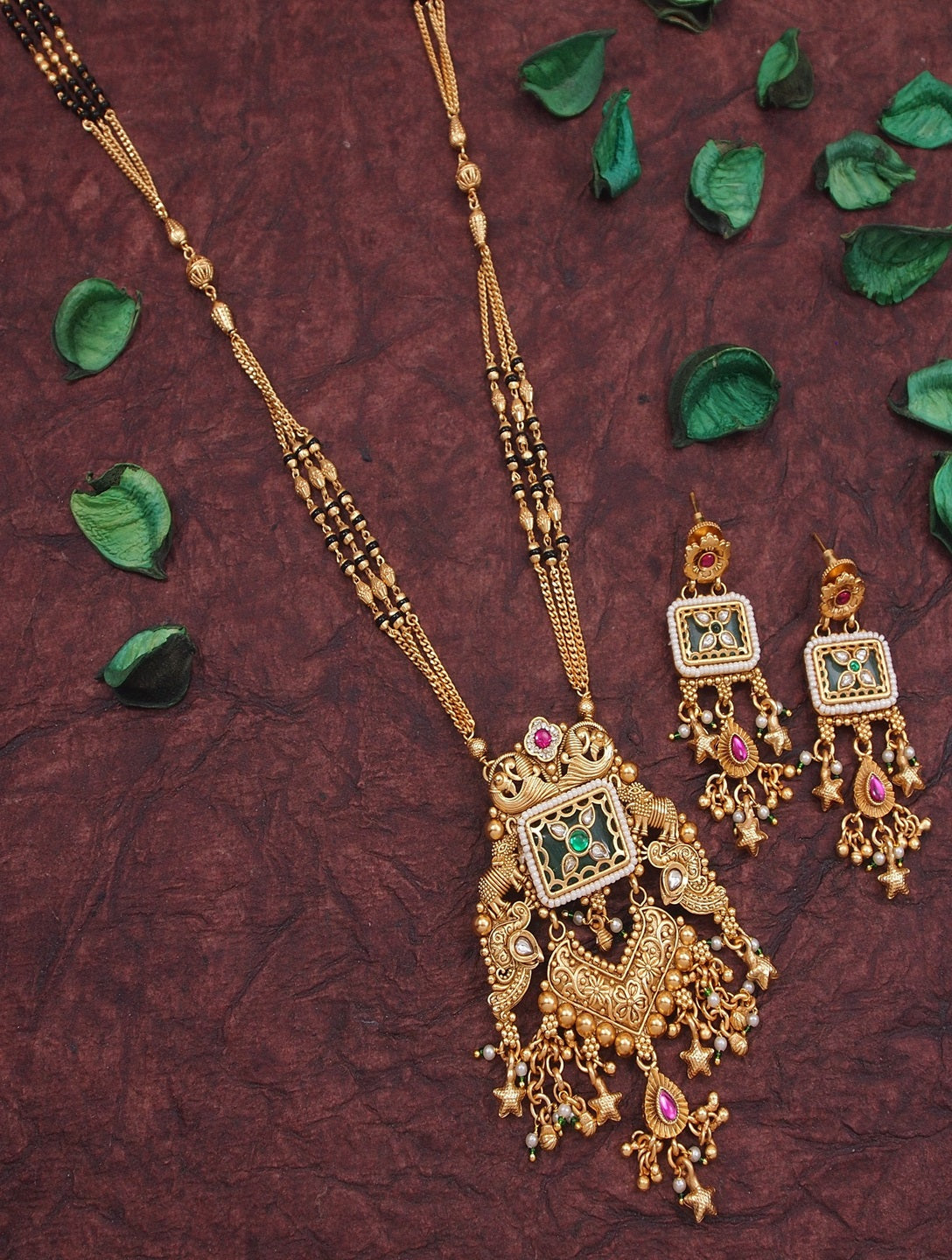 Ethnic Gold Plated Black Bead Mangalsutra Set with Ruby & Emerald Coloured Stones