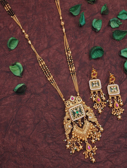 Ethnic Gold Plated Black Bead Mangalsutra Set with Ruby & Emerald Coloured Stones