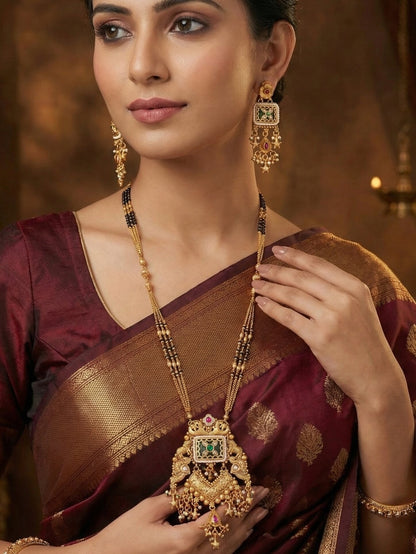Ethnic Gold Plated Black Bead Mangalsutra Set with Ruby & Emerald Coloured Stones