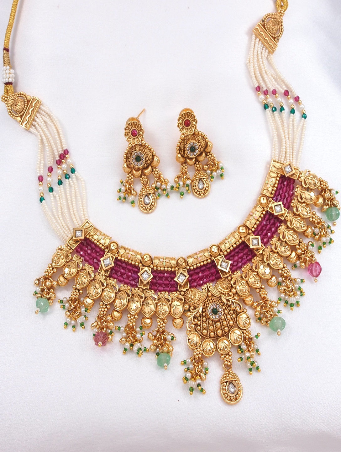 Orna Gold-Plated Traditional Kundan & Pearl Beaded Choker Necklace Set with Ruby Red Accents