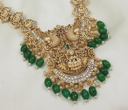 Traditional Peacock Motif Necklace with Green Bead Drops and Jhumkas