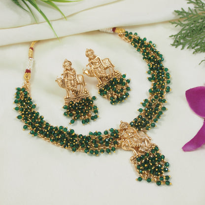 Traditional Gold-Plated Radha Krishna Necklace Set with Pearl Accents and Matching Earrings